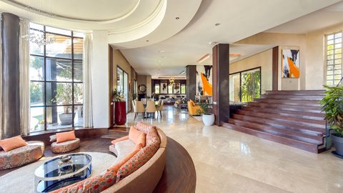 Living room and staircase inside the Iligh villa