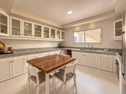 Kitchen and dining table inside the Imi Ouaddar villa